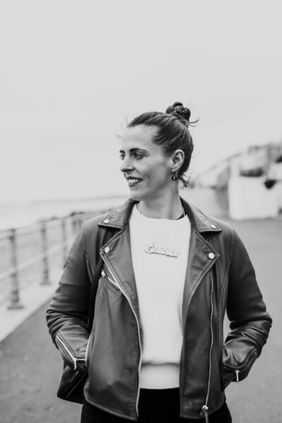 Literary Agency founder Hannah Sheppard walks by the sea